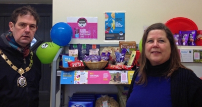 Cllr Donal Cunningham with Geraldine Anslow of Rathlin Island's community-run shop._0.jpg