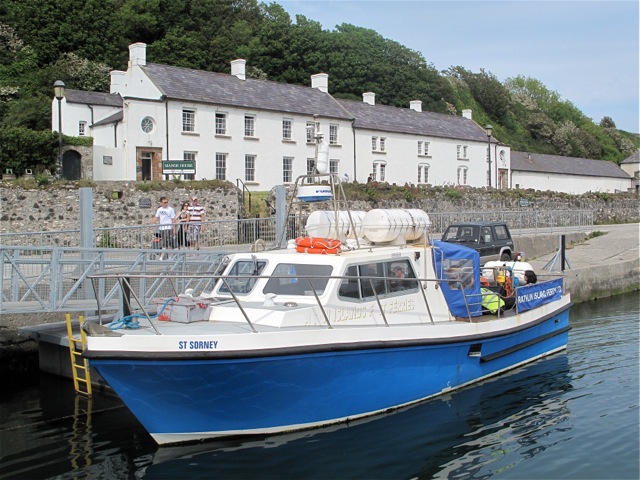 ferry-docked-on-rathlin-island-with-manor-house-an-inn-in-background-hilary-nangle-photo.jpg